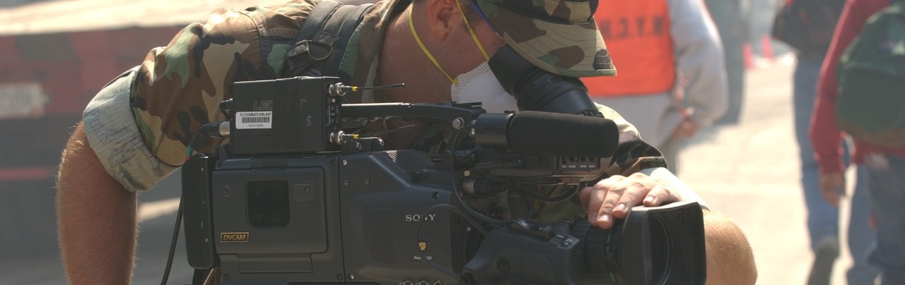 <p>A Navy combat photographer documents the scene at Ground Zero in New York City following the attacks on 9/11, 15 September 2001&nbsp;</p>
